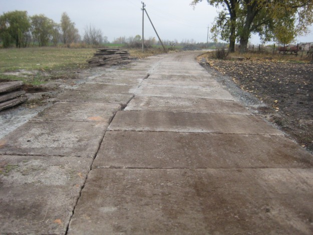 Укладка дорожных плит по Полтавской области. Укладка дорожных плит по Полтавской области. Иллюстрация.